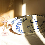 Plat de service oval fabriqué et peint artisanalement au Portugal, à motifs citrons ou vin