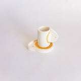 Petite tasse à café et coupelle jaunes fabriquées et peintes à la main au Portugal
